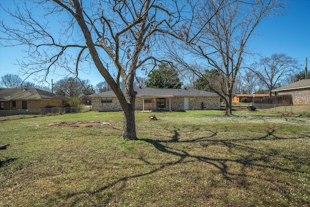 view of yard with fence