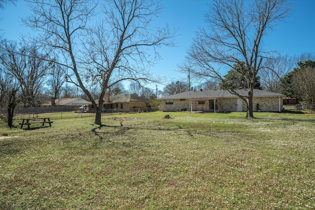 view of yard with fence