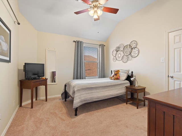 bedroom with lofted ceiling, baseboards, a ceiling fan, and light colored carpet