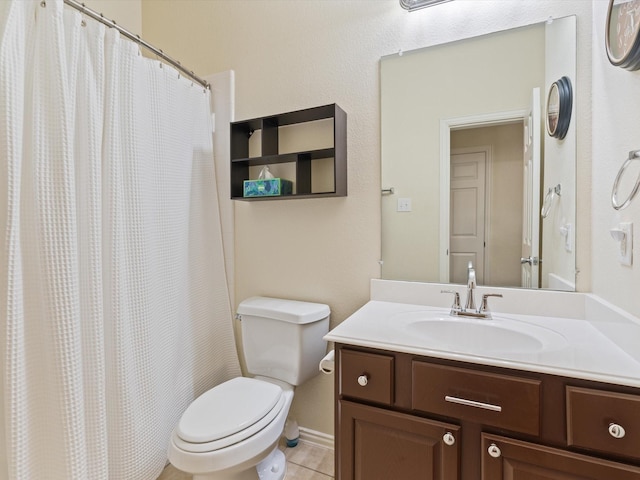 bathroom with toilet, a shower with curtain, vanity, and tile patterned floors