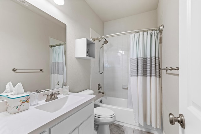 full bathroom featuring tile patterned flooring, toilet, visible vents, vanity, and shower / bath combo