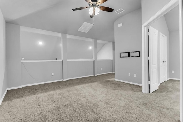 interior space featuring carpet flooring, baseboards, visible vents, and ceiling fan