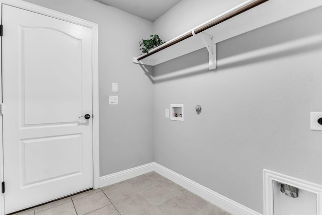 laundry room with washer hookup, gas dryer hookup, baseboards, hookup for an electric dryer, and laundry area