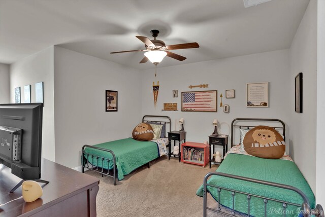 bedroom with carpet and a ceiling fan