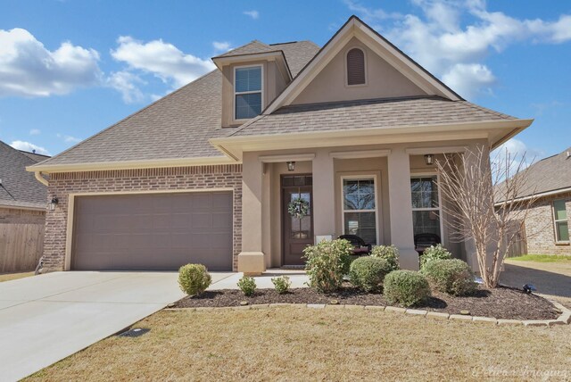 view of front of home with a garage, covered porch, a shingled roof, brick siding, and concrete driveway