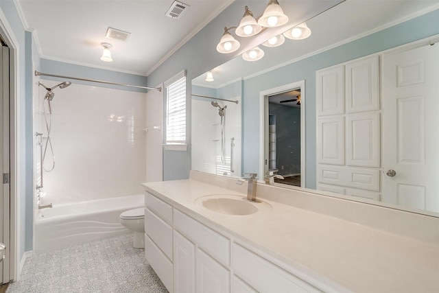 bathroom with toilet, ornamental molding, vanity, and visible vents