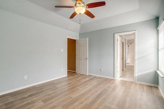 unfurnished bedroom featuring light wood-style floors, visible vents, baseboards, and a ceiling fan