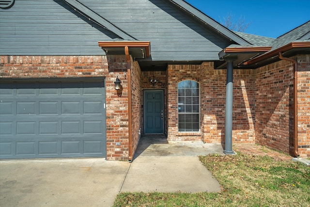 doorway to property with brick siding