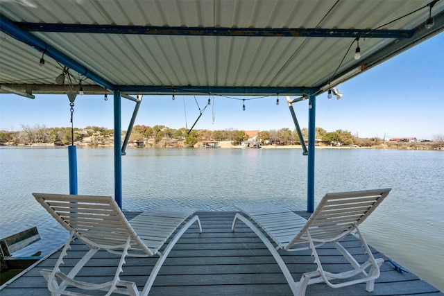 view of dock with a water view