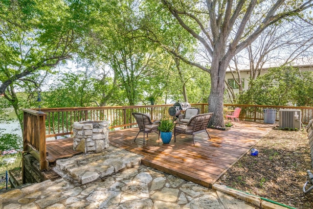 2412 Cedar Crest Dr, Granbury, TX 76048 - deck featuring central AC unit