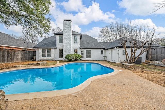 view of pool featuring a fenced backyard, a fenced in pool, and a patio