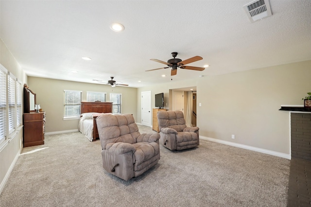 928 N Irving Heights Dr, Irving, TX 75061 - bedroom with carpet floors, multiple windows, and visible vents