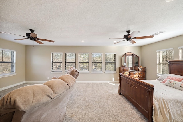928 N Irving Heights Dr, Irving, TX 75061 - bedroom featuring light carpet, baseboards, multiple windows, and visible vents