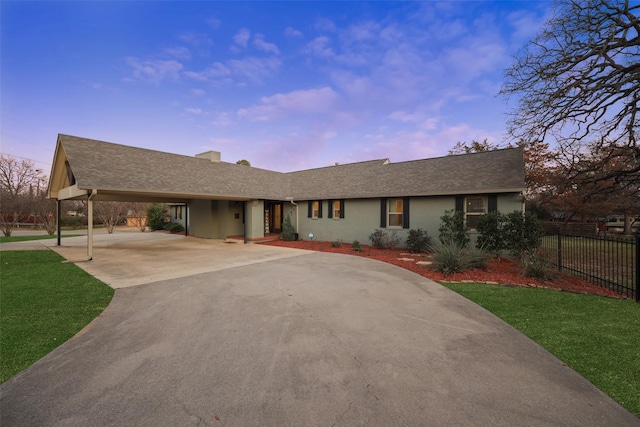 928 N Irving Heights Dr, Irving, TX 75061 - view of front of home with concrete driveway, a shingled roof, a lawn, and fence