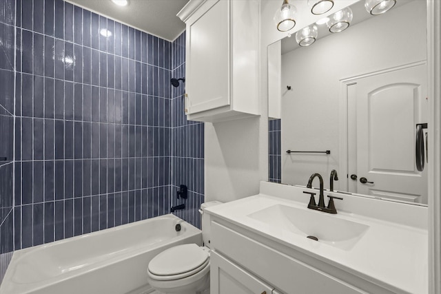 full bathroom featuring shower / washtub combination, vanity, and toilet