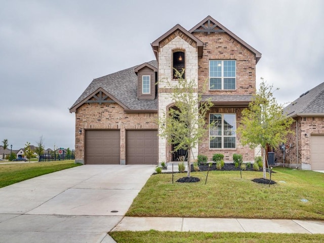 view of front of property featuring roof with shingles, brick siding, concrete driveway, a garage, and a front lawn