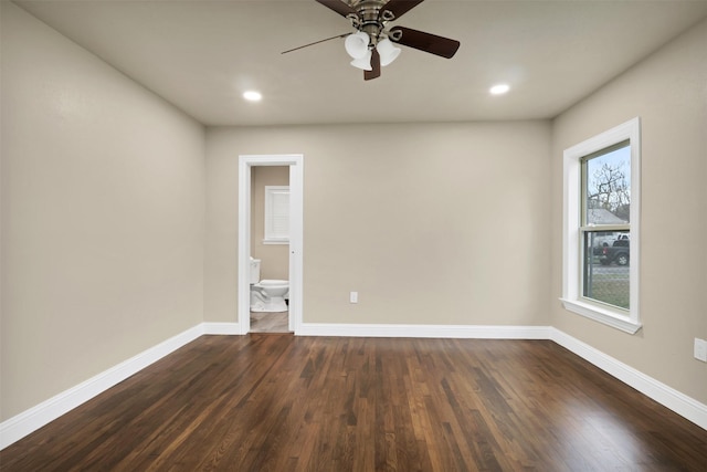 spare room with recessed lighting, dark wood finished floors, baseboards, and ceiling fan