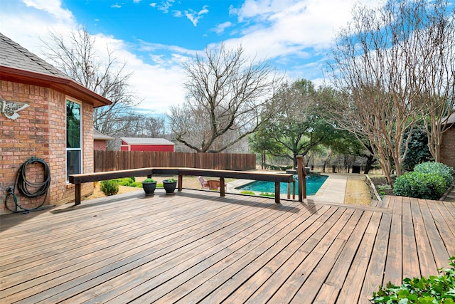 wooden deck featuring fence