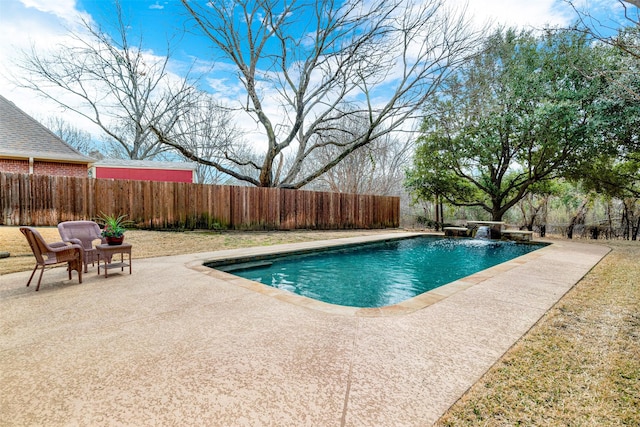 view of swimming pool with a patio area, a fenced backyard, and a fenced in pool