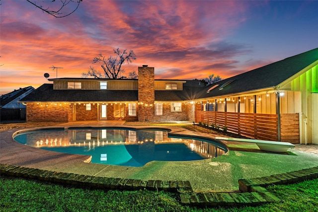 outdoor pool with a patio