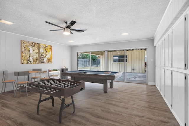 game room with ornamental molding, pool table, a ceiling fan, and wood finished floors