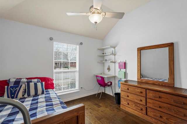 living area with lofted ceiling, ceiling fan, baseboards, and wood finished floors