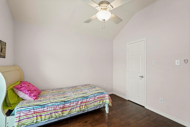 bedroom featuring vaulted ceiling, a ceiling fan, hardwood / wood-style flooring, and baseboards