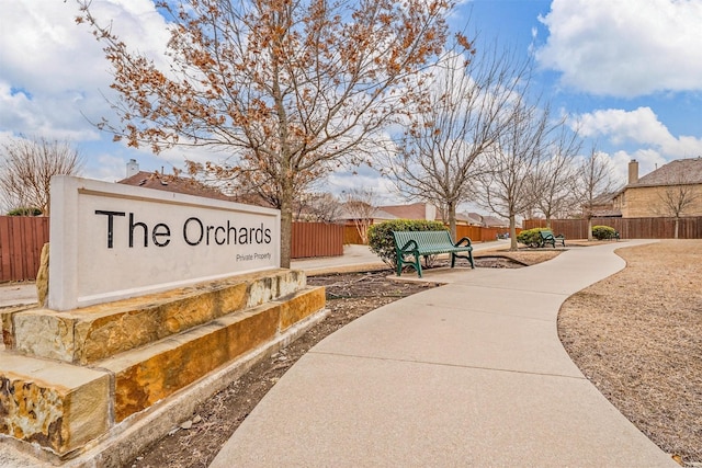 surrounding community featuring fence