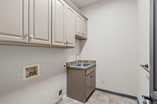 clothes washing area featuring hookup for a washing machine, cabinet space, a sink, and electric dryer hookup