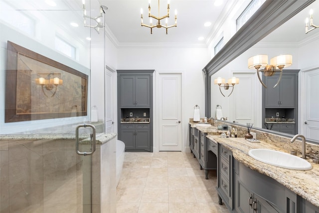 full bathroom with a stall shower, a chandelier, crown molding, and vanity