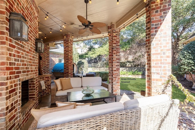 view of patio with ceiling fan and an outdoor hangout area