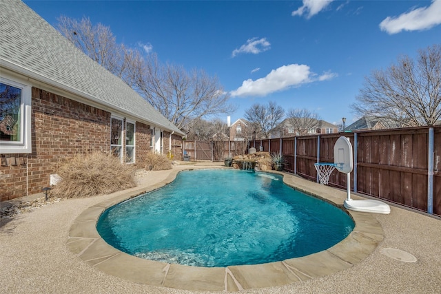 view of pool featuring a fenced in pool and a fenced backyard