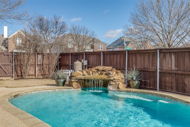 view of pool with a fenced backyard and a fenced in pool