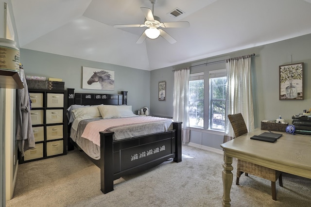 bedroom featuring ceiling fan, light colored carpet, visible vents, baseboards, and vaulted ceiling