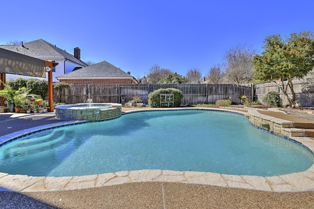 view of swimming pool featuring a patio area, a pool with connected hot tub, a fenced backyard, and a pergola