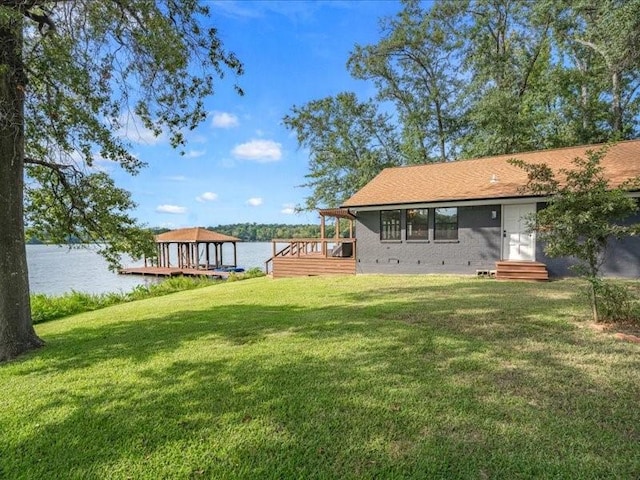 exterior space featuring entry steps and a water view