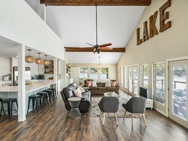 living area with high vaulted ceiling, dark wood-type flooring, and beamed ceiling