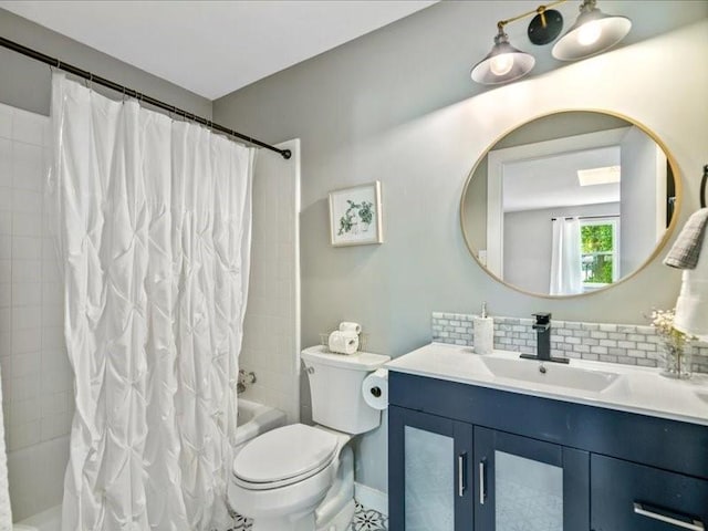 full bath with tasteful backsplash, shower / bathtub combination with curtain, toilet, and vanity