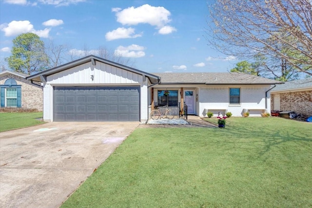 ranch-style home with a front lawn, an attached garage, and brick siding