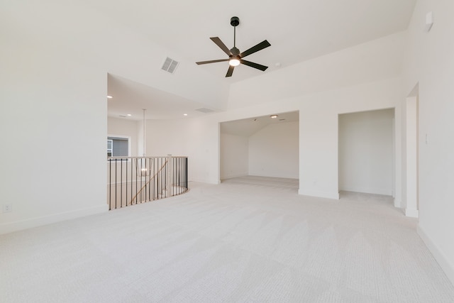 830 Montrose Dr, Rockwall, TX 75087 - empty room with light colored carpet, a ceiling fan, recessed lighting, and high vaulted ceiling