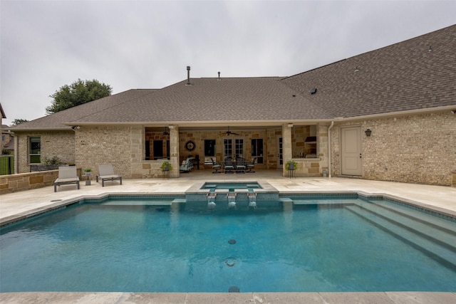 view of pool with a pool with connected hot tub, a patio, and ceiling fan