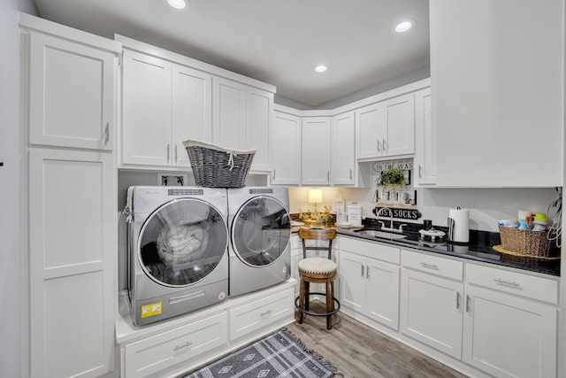 19909 County Road 1102, Flint, TX 75762 - clothes washing area featuring separate washer and dryer, recessed lighting, and light wood finished floors