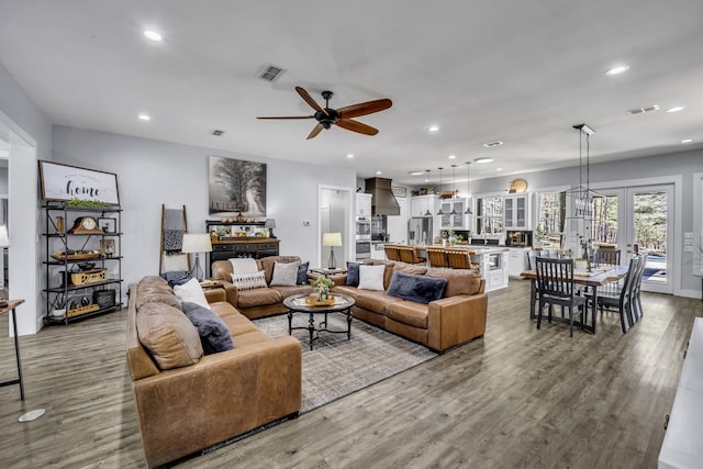 19909 County Road 1102, Flint, TX 75762 - living area with ceiling fan, recessed lighting, and wood finished floors