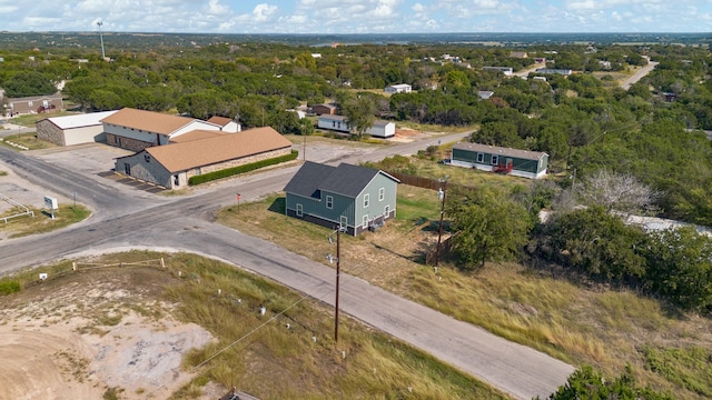 aerial view with a wooded view