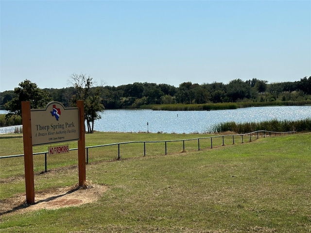 water view featuring fence