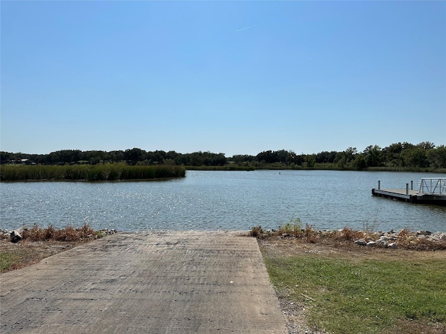 property view of water featuring a floating dock