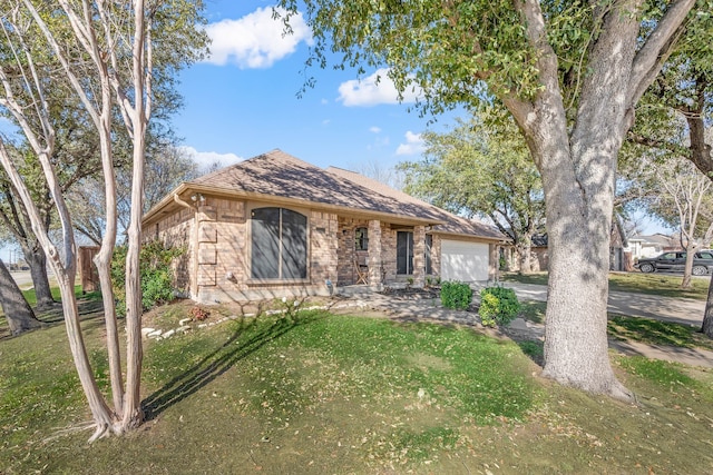 ranch-style home featuring driveway, a front lawn, a shingled roof, a garage, and brick siding