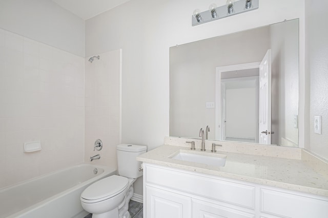 bathroom with shower / bath combination, vanity, and toilet