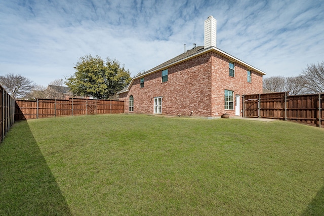 view of yard featuring a fenced backyard