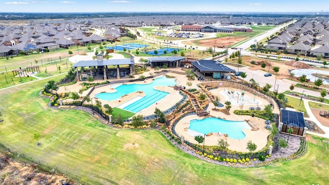 10508 Bluestone Ln, Aubrey, TX 76227 - aerial perspective of suburban area with a pool